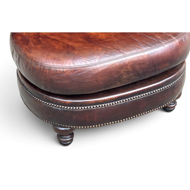 Vintage Oval Brown Leather Ottoman With Brass Nailhead Trim and Carved Wood Feet For Sale - Image 9 of 9