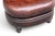 Vintage Oval Brown Leather Ottoman With Brass Nailhead Trim and Carved Wood Feet For Sale - Image 9 of 9