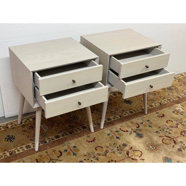 Design Plus Gallery presents a Pair of Mid Century Nightstands in Pebble from Williams-Sonoma. Discover the timeless...