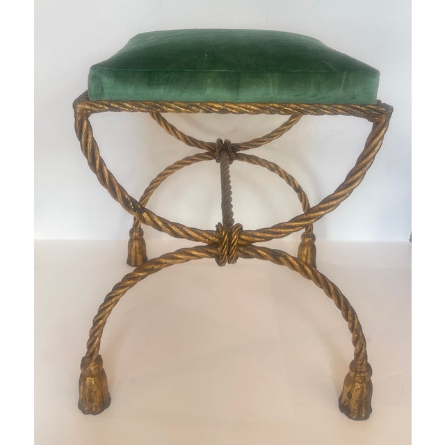 Just in, this 1950s Italian Hollywood Regency Rope & Tassel Gilt Metal Stool with a new upholstered seat in a Green...