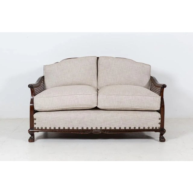 Antique circa 1930 1930’s english mahogany bergere suite. Reupholstered in linen with foam core feather wrap cushions...