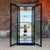 This beautiful display cabinet by Jasper Cabinet features an eye catching semi-gloss black finish with contrasting brass...