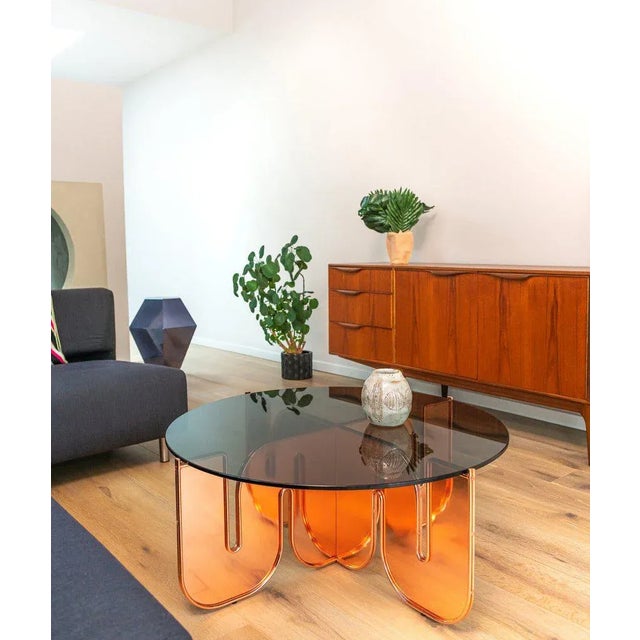 Wave Table is the most interesting example of functional art. It has a high-energy, wave-shaped base made of lucite. Wave...