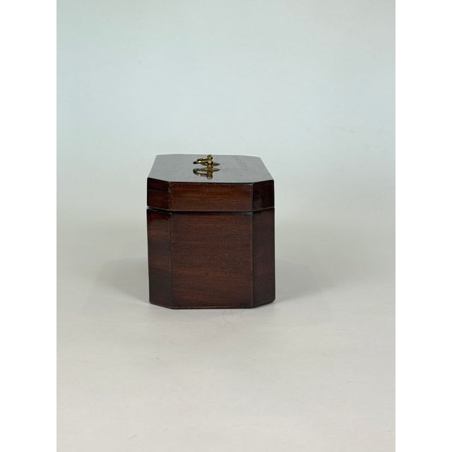 This gorgeous tea caddy exhibits characteristics of the Regency Period (1811-1820) with its octagonal shape and polished...