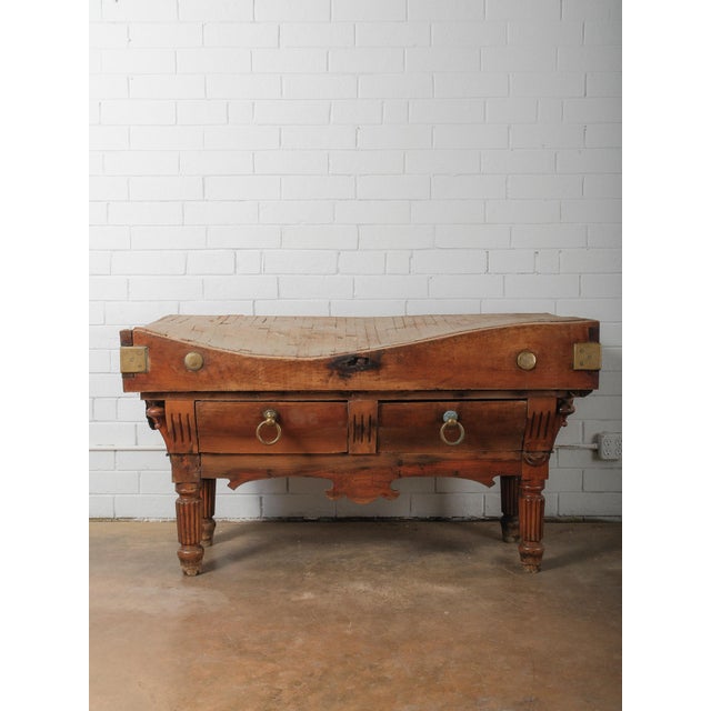 An exceptional 19th-century French butcher’s block table, masterfully handcrafted from solid beech wood and resting on...