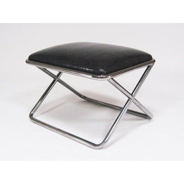 This rare piece designed by Ward Bennett for Geiger is the matching ottoman for his chrome framed Scissor chair, but it...