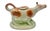 A wonderfully whimsical, 19th century Staffordshire cow creamer, beautifully modeled as a standing dairy cow with a...