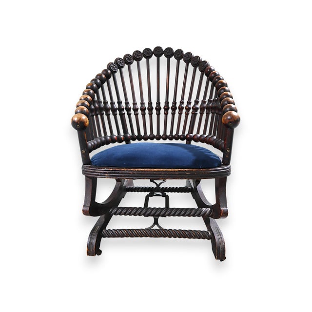 This extraordinary antique rocking chair was designed by innovative Victorian furniture maker George Hunzinger. Originally...