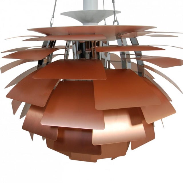 Poul henningsen's artichoke lamp, with shades of copper and integrated led. The lamp is from 2023 and appears in great...