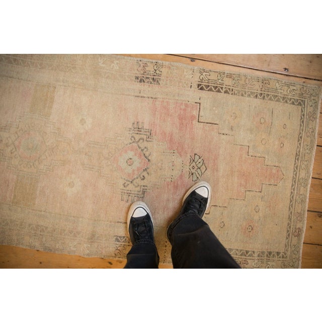 :: Double stepped center medallions atop a heavily abrashed field with corner spandrels loosely reciprocating the contour...