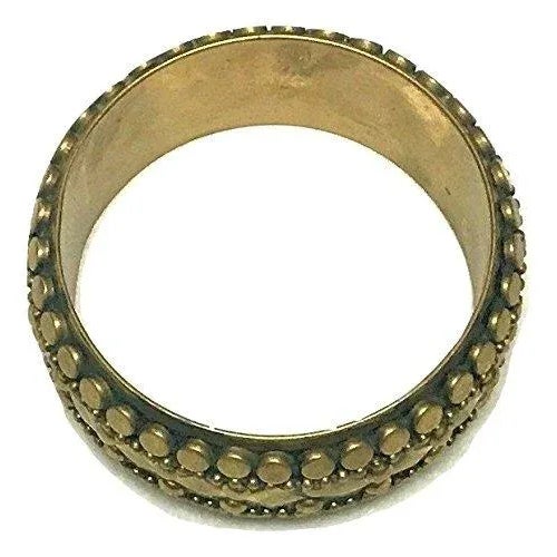 This 1960's bangle exemplifies the timeless elegance of Art Deco design with its intricate craftsmanship and bold...