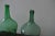 Hungarian wine bottle, pair Color: green Materialsglass Condition good, wear consistent with age and use.