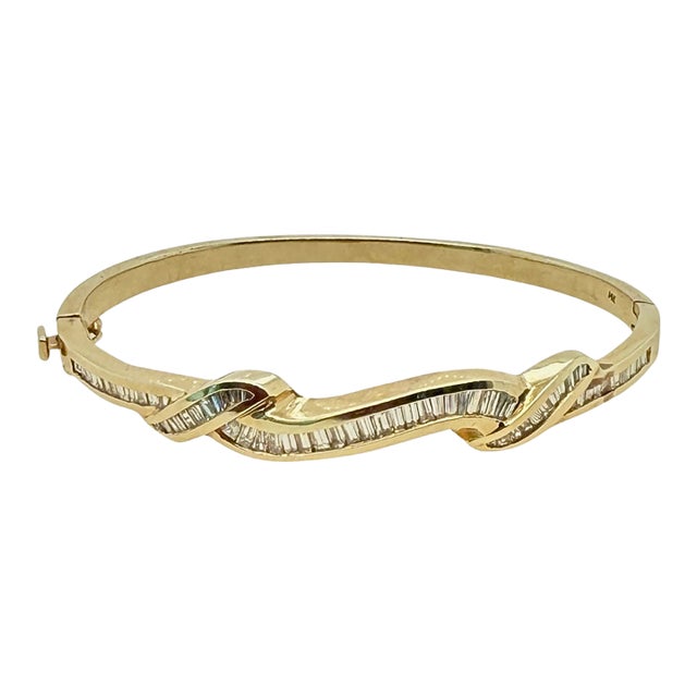 1980s 14k Yellow Gold Baguette Diamond Ribbon Bangle Bracelet For Sale