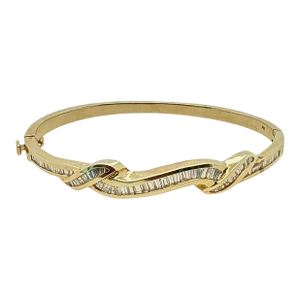 1980s 14k Yellow Gold Baguette Diamond Ribbon Bangle Bracelet
