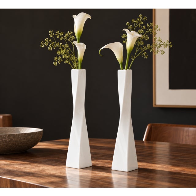 A beautiful pair of 1950's-era art pottery vases, designed by Arthur Percy for Karlskrona. Standing at 12.5 inches, the...