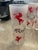 Tom Collins glasses by Libbey from the 1950’s. There are four glasses available. Pattern is Cavalcade with red leaping...