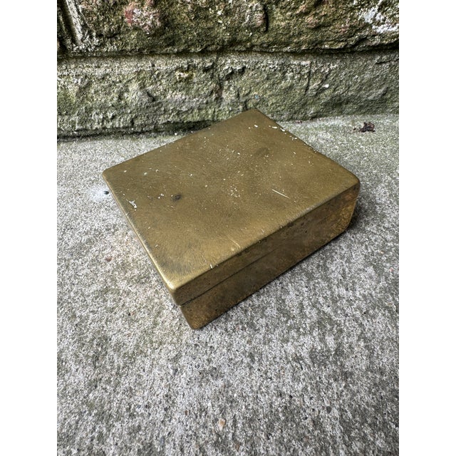 19th Century brass betel nut box. This tiny brass box is the perfect decorative accessory to add a pop to any table top it...