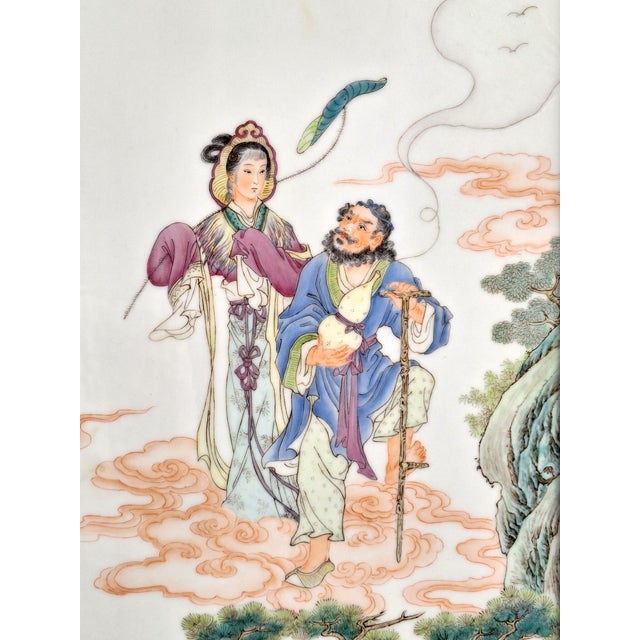 Chinese porcelain Ba Xian plaque, finely painted, Qianjiang style scene in polychrome glazes of two of the Chinese Eight...