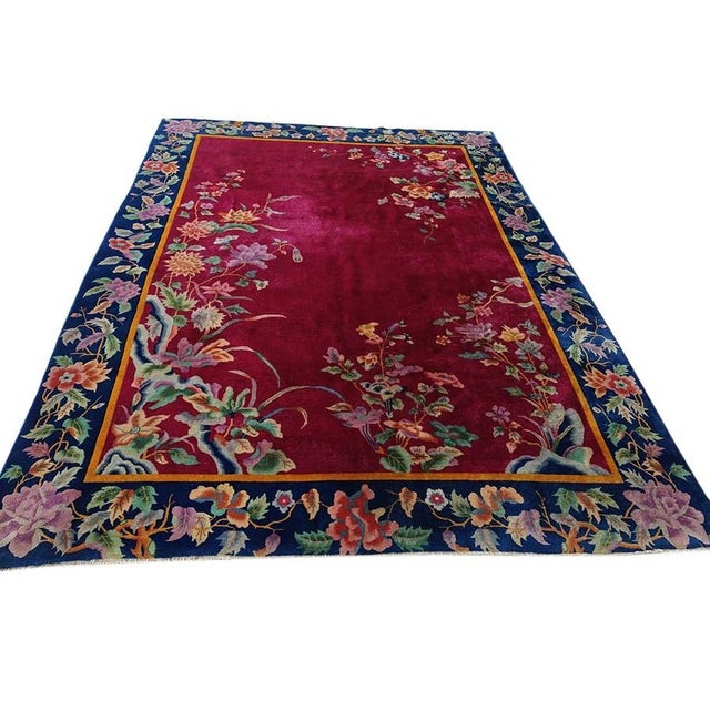 Hand Knotted Pile Red Rectangle Wool 1920s Antique Rug, Circa Date: 1920s. This exceptional wool piece represents the...