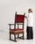 An 18th century French throne chair in the Renaissance style, constructed in wood with upholstered elements. The design...