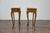 A pair of Italian Louis XV style walnut console tables with serpentine fronts, cabriole legs and single drawers. This...