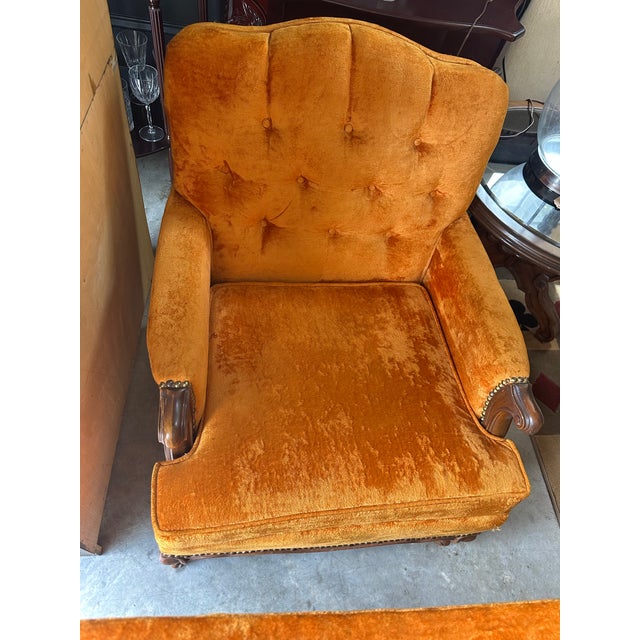 Add a pop of retro luxury to your space with this stunning 1970s sofa. Featuring vibrant tangerine-gold crushed velvet...