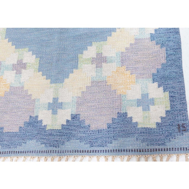 Vintage Swedish Flat Woven by Ingegerd Silow Size: 4'6" × 6'7" (137 × 200 cm) This vintage Swedish flat-weave rug,...