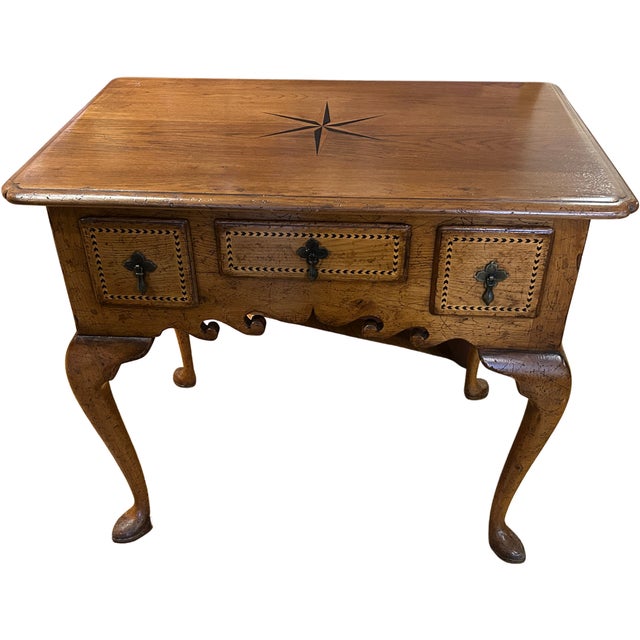 3 drawer English lowboy with plaque made from circa 15th c. roof timbers from Norwich Cathedral. Six pointed star inlay on...