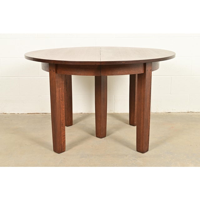 A rare and exceptional antique Mission or Arts & Crafts period quarter sawn oak extension dining table By L. & J.G....