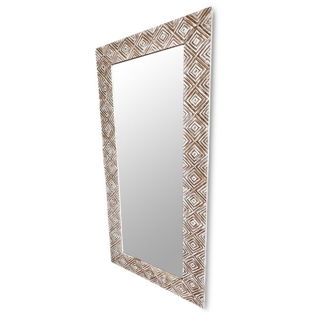 Vintage white washed wood mirror with intricate hand carved diamond pattern. Tones of white and tan create a subtle...