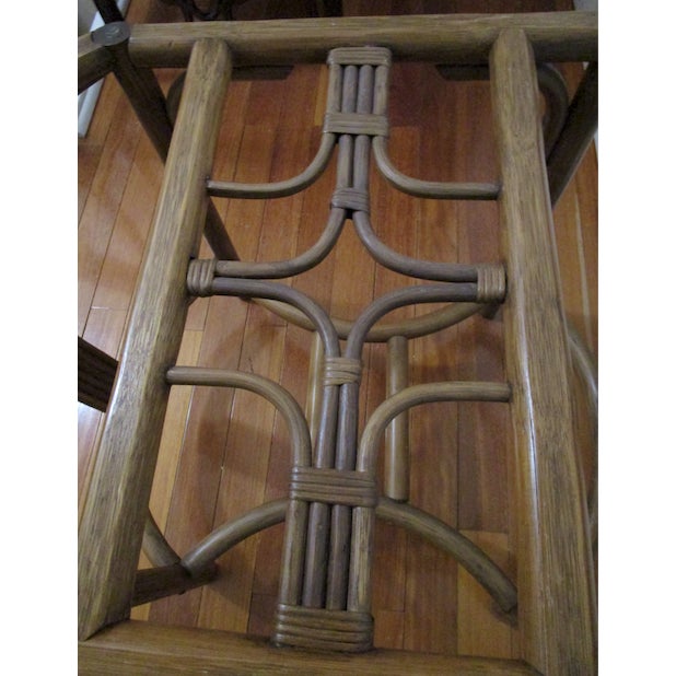 This is the most beautiful vintage bamboo end table or small coffee table with a glass top. The table has a glass top and...