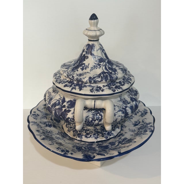 A classic Royal Worcester English porcelain covered tureen, rendered in an elegant blue and white floral transferware...
