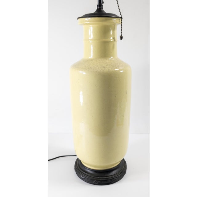 We are selling this stylish Chinese style Chinoiserie table lamp. This lamp is probably American porcelain made to copy an...