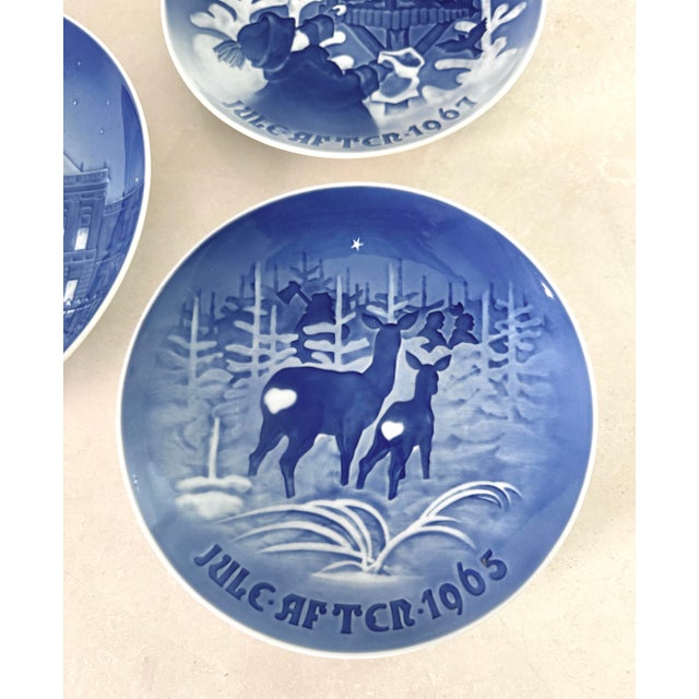 1960s Bing and Grondahl Christmas wall plates from Denmark. Includes the following years: 1964, 1965, 1967, 1970, and...