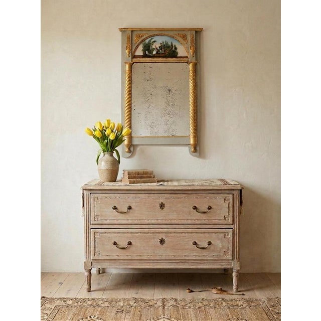 French Trumeau style mirror from the Restoration period, circa 1830. It retains its original mercury glass, fine gold...