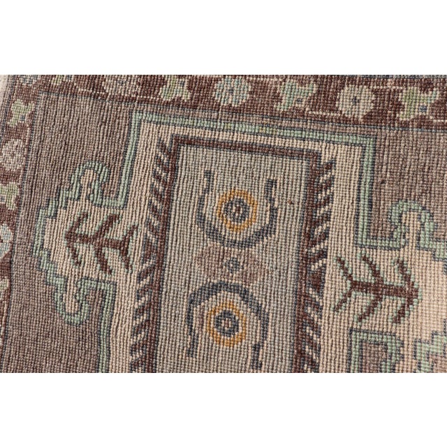 Taupe Long Turkish Oushak Runner in Pale Taupe With Blue and Soft Green Motifs For Sale - Image 8 of 12
