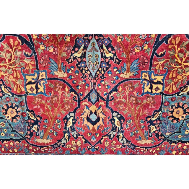 Presenting a true masterpiece of Persian artistry, this extraordinary vintage Persian Tabriz rug is a testament to the...