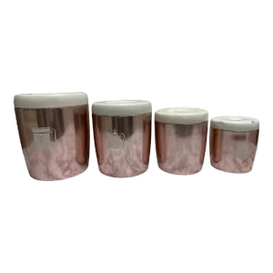 Set of Four Vintage 1940s/50s Pink Metal Kitchen Canisters Set.