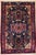 Antique hand-knotted rug from the Nahavand region of western Iran, featuring a complex geometric-medallion composition set...