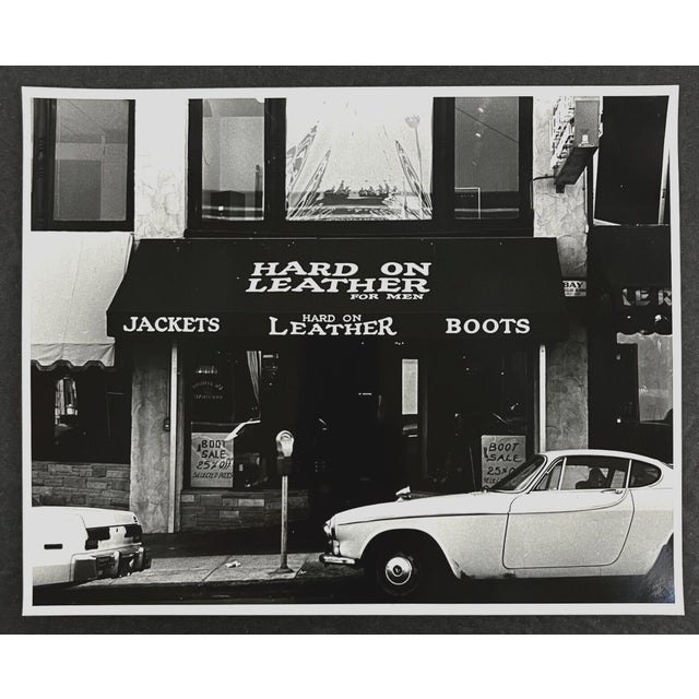 1970s b & w photograph by Alex Davidonis of a leather store in the Castro in San Francisco, popular with the gay...