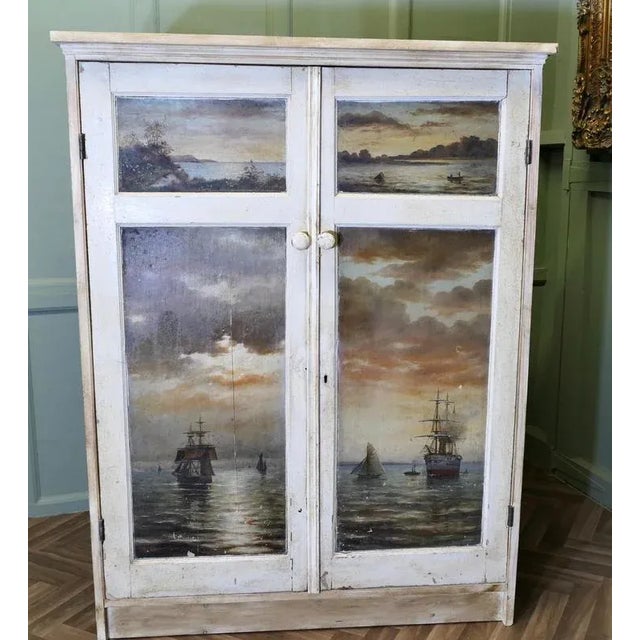 Hand Painted Cupboard, 4 Oil Seascape Paintings This cupboard has been made using 4 wooden panels these were painted in...