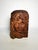 A wooden sculpture of a head, France, 1960s, with an expressive and profoundly organic character. Carved from a solid...