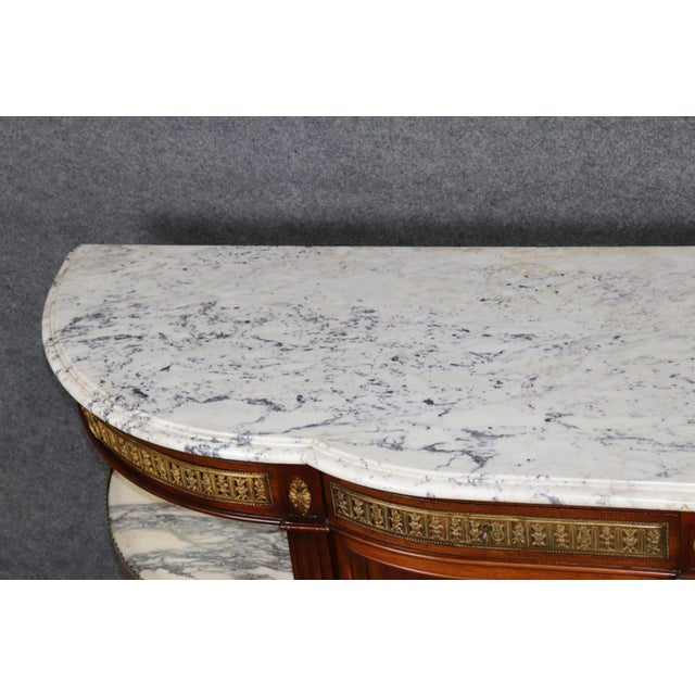 An extraordinary grand-scale Louis XVI-style sideboard or dessert server, dating to the late 19th or early 20th century,...