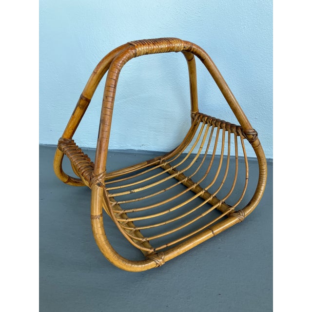This is a very nice mid-century modern Bamboo and Rattan magazine, probably dates from the 1960s-70s. This magazine rack...