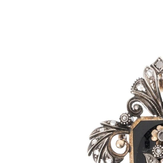 Joais - Silver and 19.2K gold brooch. Portuguese; 20th century; brooch and pendant in 833% silver and 19.2kt gold; set...