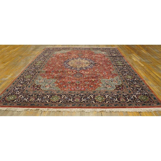 "This exceptional 1940 Antique Tabriz Persian Formal rug showcases the historic craftsmanship of Iran's renowned weaving...