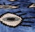 "Vibrant, artistic, and unmistakably luxurious, this handmade Ikat lumbar pillow brings bold energy into refined...