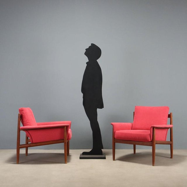 A pair of "118" armchairs designed by Grete Jalk for France & Son in the 1960s. The frame is made of teak, known for its...