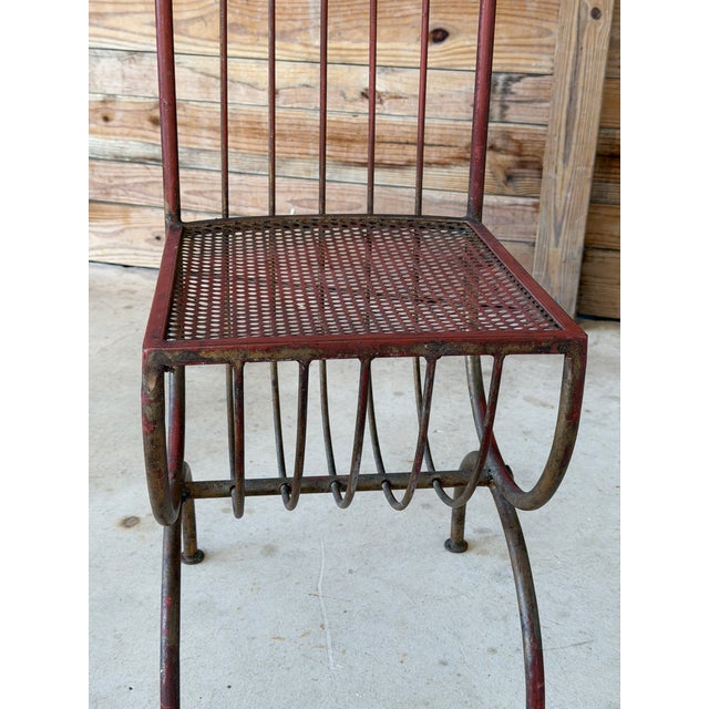A wonderfully unusual vintage Italian iron accent chair attributed to designer S. Salvadori. The sculptural frame features...