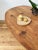 Large enough for dining, this Oval shaped 19th century vendange table features a hand carved pine top on an oak base and...